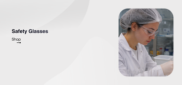 A woman on a laboratory using safety glasses with a text saying "safety glasses shop" on a white background